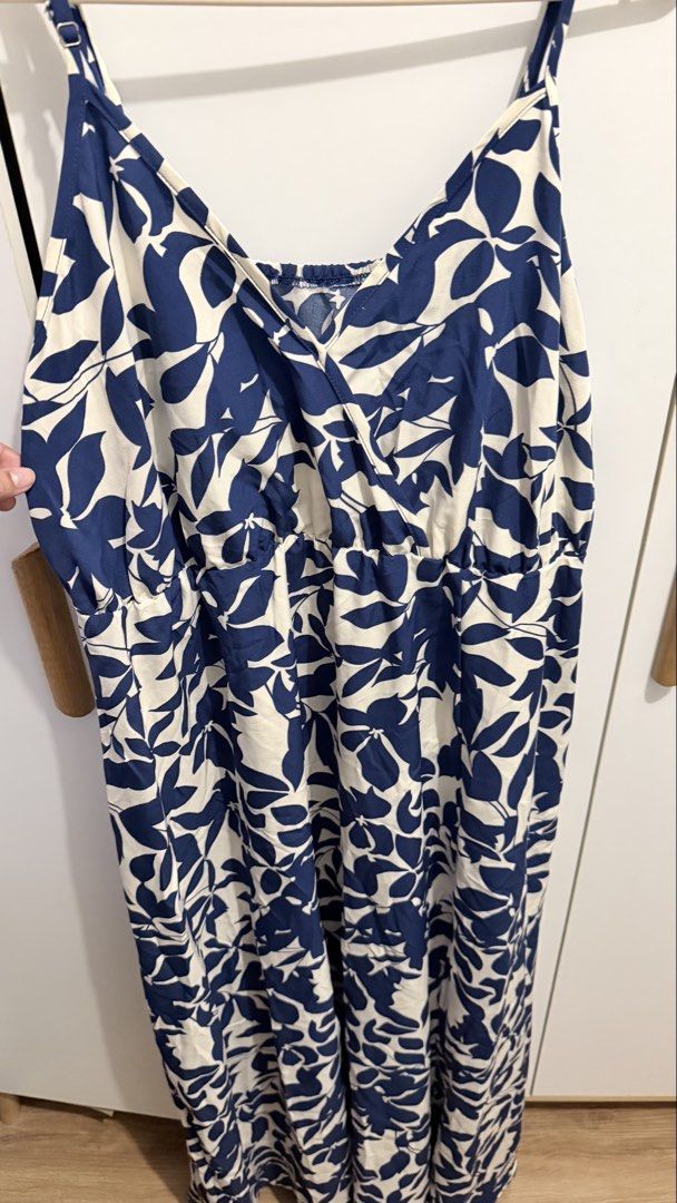 Blue and White Leaf Print Maxi Dress (Category: Dresses) located in Pasay City. Submitted by thriftyfinds90 (Listing ID 1463135778, Image 3). Description: - Flowy maxi dress - Blue and white leaf print - Adjustable spaghetti straps - Flattering V-neckline - Empire waist for a comfortable, relaxed fit. With belt/tie - Ideal for casual outings or beach vacations - Easy to wear and style ✨ Mostly new/almost new or worn 1–2x. Most fit XL–XXL sized wo