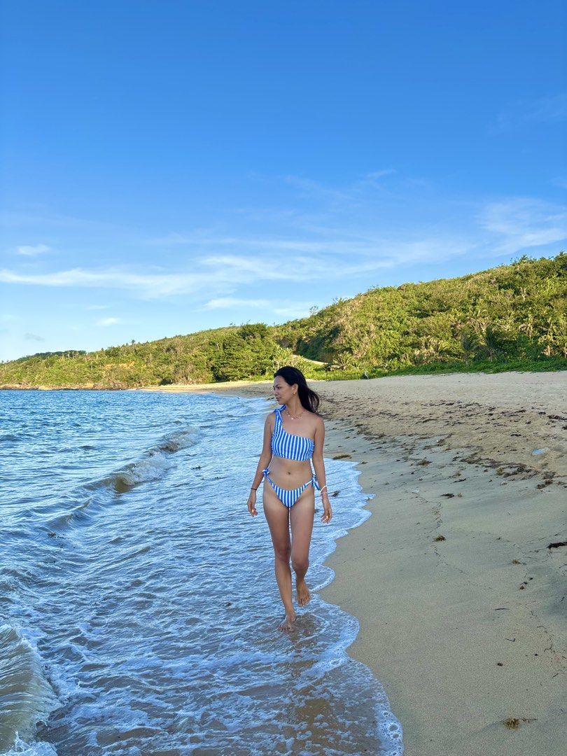 Blue and White Striped One-Shoulder Bikini (Category: Bikinis & Swimsuits) located in Polangui. Submitted by zrhmendoza34061 (Listing ID 1463293020, Image 2). Description: Used once - Adorable blue and white striped bikini - Trendy one-shoulder top with tie details - Matching bottoms with adjustable tie sides - Ideal for beach days and pool parties - Comfortable, stylish, and vacation-ready.
