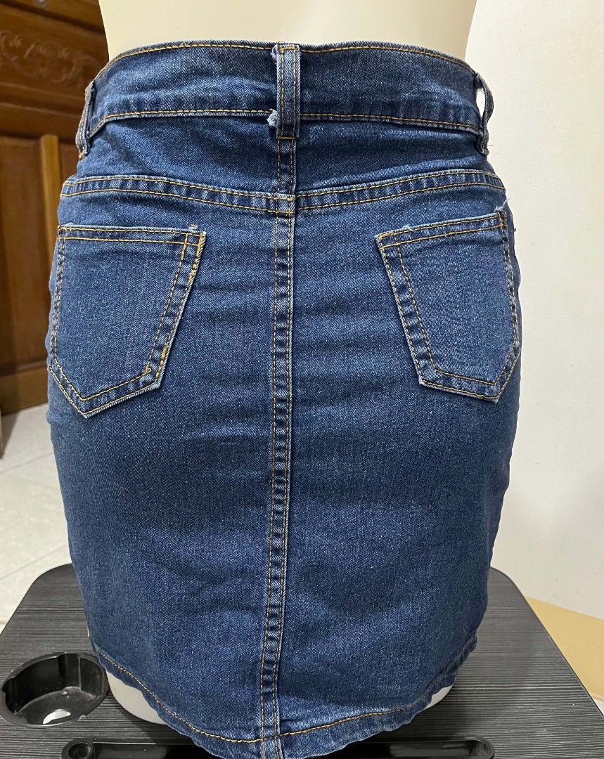 Blue Denim Pencil Skirt (Category: Skirts) located in Quezon City. Submitted by syayayay (Listing ID 1463216868, Image 2). Description: - Classic blue denim pencil skirt - Mid-rise fit - Button and zip closure - Two front pockets - Two back pockets .