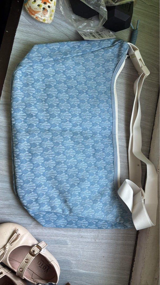 Blue patterned sling bag with adjustable strap (Category: Sling Bags) located in Quezon City. Submitted by albertojay09 (Listing ID 1463193870, Image 2). Description: - Stylish cool blue sling bag with a unique all-over pattern. - Main zippered compartment for secure storage. - Convenient outer pocket with a flap closure. - Adjustable strap with a buckle for a customized fit. - Ideal for everyday wear and casual outings. - anta kai bag unreleased