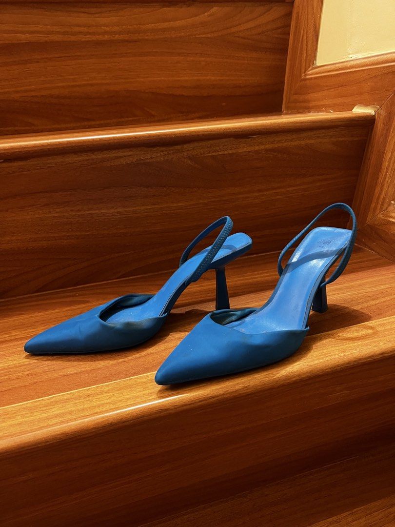 Blue Slingback Pointed Toe Heels (Category: Heels) located in Taguig. Submitted by banannananas (Listing ID 1463294989, Image 2). Description: - Stylish blue slingback heels - Elegant pointed toe design - Secure and comfortable elastic strap at the back - 2inch heel height - Ideal for both casual and formal outfits - Please note: Minor delt on the side , as pictured..