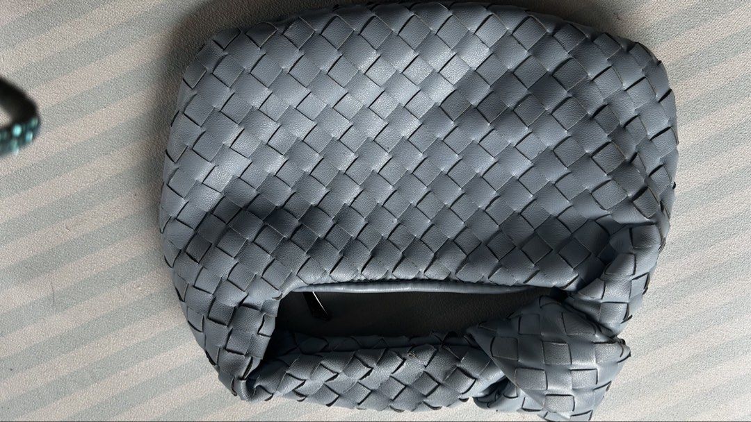 Blue Woven Leather Handbag (Category: Tote Bags) located in Bulacan. Submitted by peachyaguilar (Listing ID 1463132757, Image 2). Description: - Blue woven leather handbag - Zipper closure at the top - Soft leather with a nice texture - Features a woven strap - Unique and stylish design - Ideal for carrying your daily essentials.