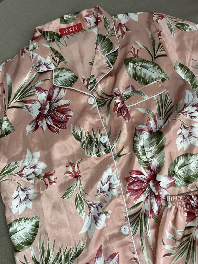 Blush Floral Pajama Set (Category: Undergarments & Loungewear) located in Quezon City. Submitted by hygge.elements (Listing ID 1463215655, Image 2). Description: 🌸 Floral Pajama Set for Women 🌸 Beautiful floral lounge set — perfect for peaceful nights and slow days at home. 🤍 ✨ Features: • Feminine blush floral design • Classic button-down short sleeve top • Matching comfortable shorts • Relaxed fit for lounging and sleeping • Soft, elegant ho