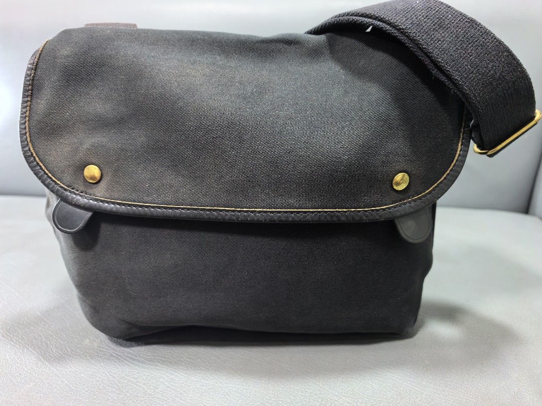 Brady Black Canvas Leather Trim Messenger Bag (Category: Sling Bags) located in Cagayan de Oro. Submitted by pootx (Listing ID 1463269741, Image 1). Description: - Brand: Brady - Style: Messenger Bag - Material: Black Canvas with Leather Trim - Hardware: Brass - Interior: Lined with a pocket - Strap: Adjustable for comfort - Dimensions: Approx. 12 inches wide x 9 inches tall - Ideal for: Everyday use, travel.