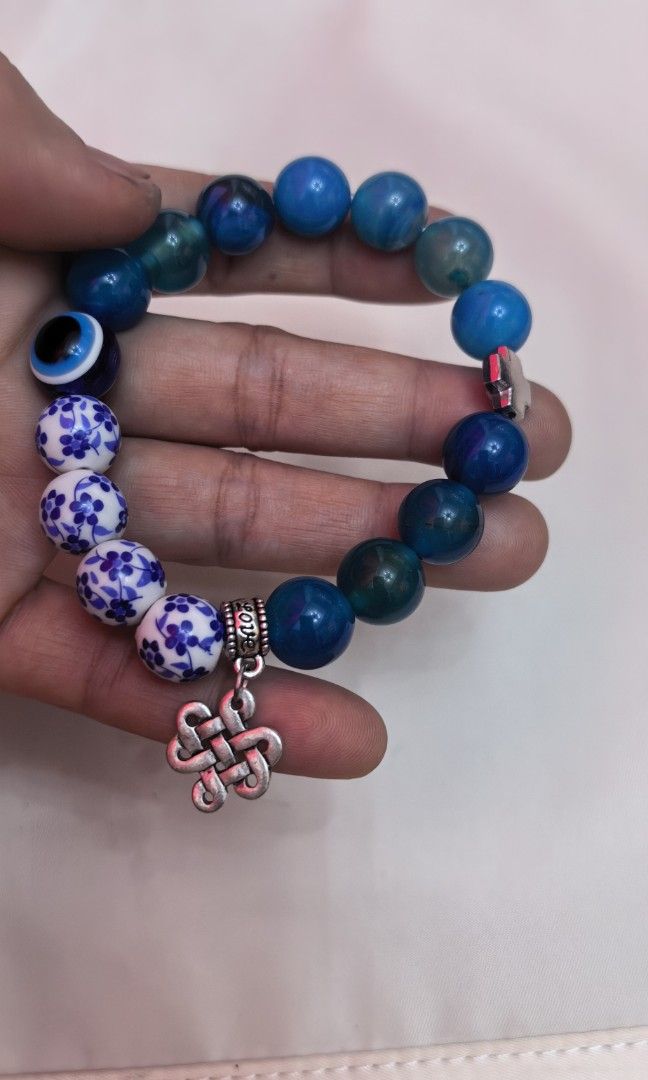 Brand new with box blue stone with celtic charm (Category: Bracelets) located in Tuguegarao City. Submitted by zenphoenix-7ad615 (Listing ID 1463183387, Image 2). Description: Brand new With charms.