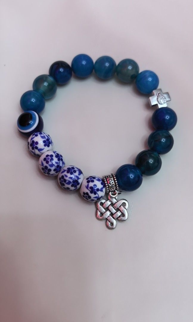 Brand new with box blue stone with celtic charm (Category: Bracelets) located in Tuguegarao City. Submitted by zenphoenix-7ad615 (Listing ID 1463183387, Image 3). Description: Brand new With charms.