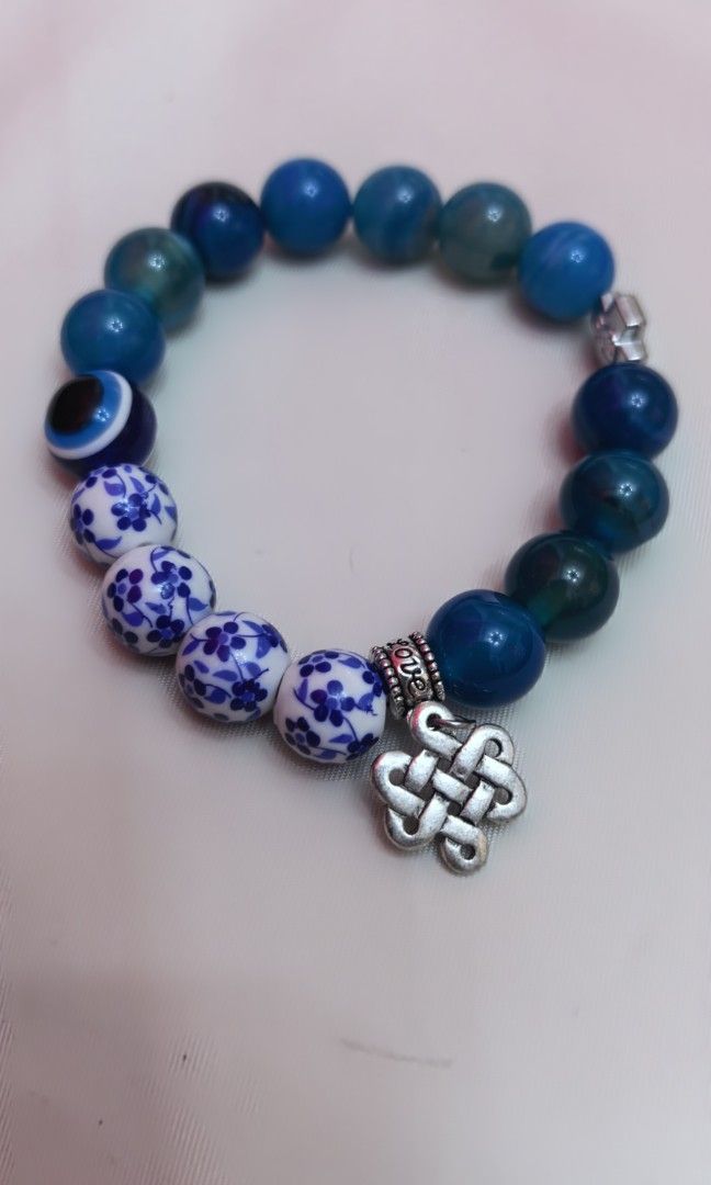 Brand new with box blue stone with celtic charm (Category: Bracelets) located in Tuguegarao City. Submitted by zenphoenix-7ad615 (Listing ID 1463183387, Image 1). Description: Brand new With charms.