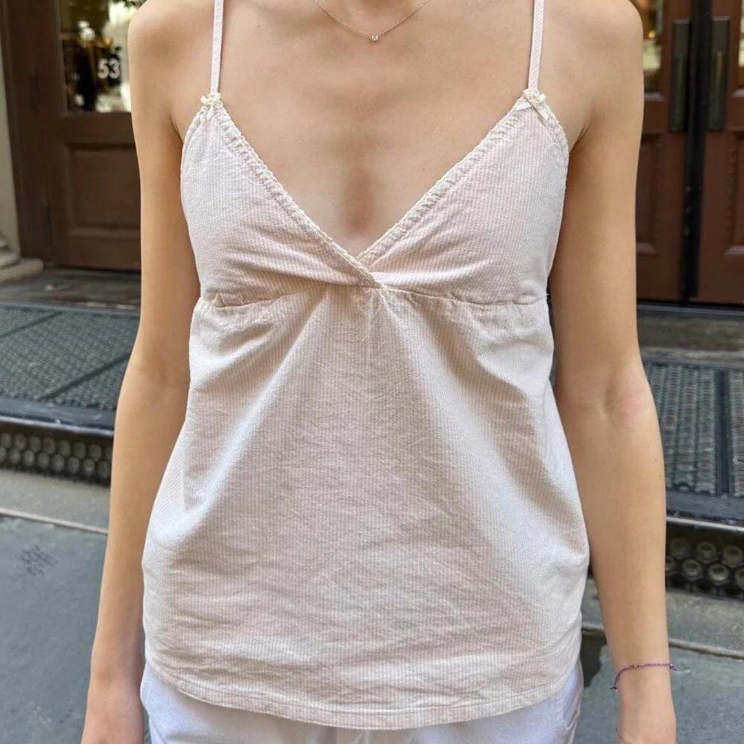 Brandy Melville Pink Striped Edith Babydoll Cami Top | cotton on revivo edikted h&m stradivarius hollister urban outfitters bershka zara (Category: Sleeveless) located in Vigan. Submitted by rainberry (Listing ID 1463160129, Image 1). Description: 15in width 17in length w/o shoulder strap - 100% cotton - pink and white cream stripes - like new! neckline too low, i dont rily use it.