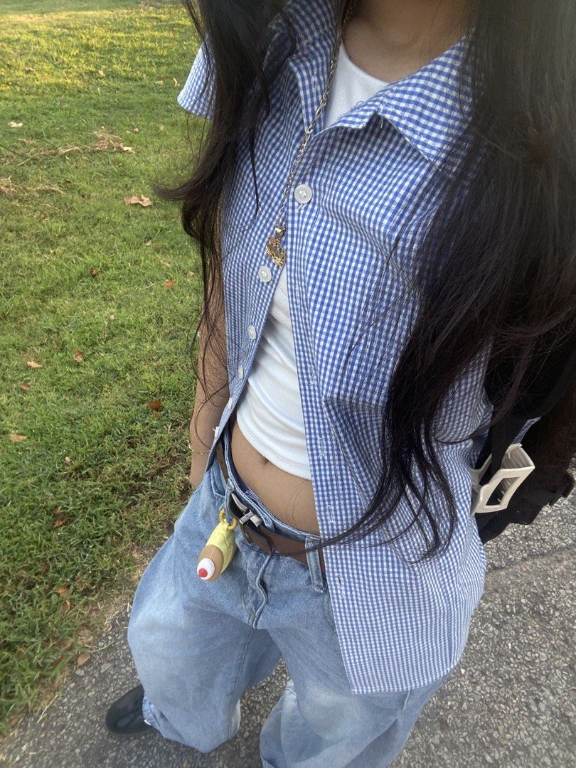 Brandy Melville Rue Blue Gingham Button Up Shirt (Category: Shirts) located in Vigan. Submitted by rainberry (Listing ID 1463160287, Image 2). Description: 15in width 21in length - 95% cotton, 5% elastane - blue gingham pattern .