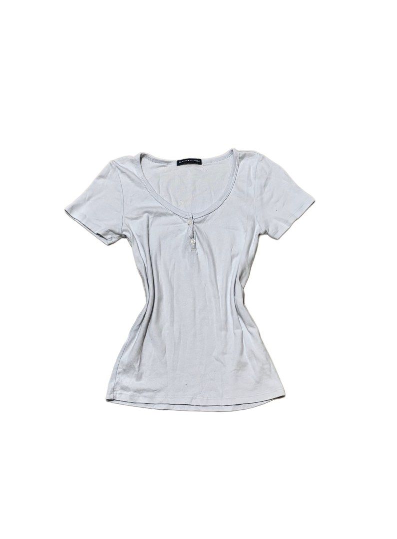 Authentic Brandy Melville White Henley Top (Category: Shirts) located in Manila. Submitted by retrocancer (Listing ID 1463220025, Image 1). Description: size small-medium no issue.