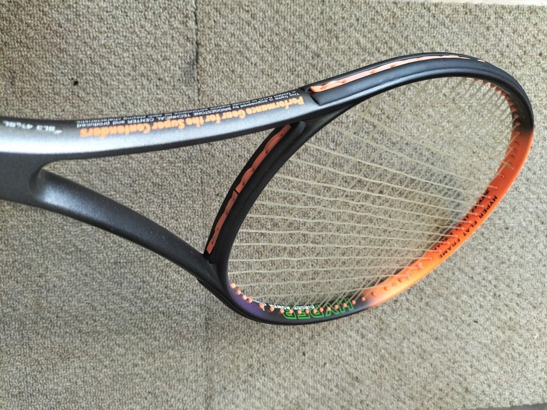 Bridgestone Hyper Xi Tennis Racket (Category: Racket and Ball Sports) located in Cainta. Submitted by banzvi73 (Listing ID 1463180493, Image 3). Description: - Bridgestone Hyper Xi Tennis Racket - Head Size: 110 sq in - Weight: 330g - Grip Size: 3 - Condition: 9.5/10 (Great) - Price: PHP 750.