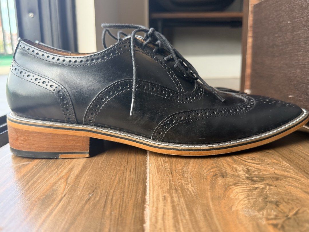 [USED ONCE] Bristol Black Wingtip Oxford Shoes (Category: Dress Shoes) located in Pasig City. Submitted by dannahpaloyo (Listing ID 1463216408, Image 3). Description: - Size 43 - Used once - Bought September 2026 - Original sale price Php 4,784.00 (see last photo) - Minor scratch on the tip of left shoe (see 2nd photo) - Comes with Original Box MOP: Bank Transfer Location: QC/Bulacan.