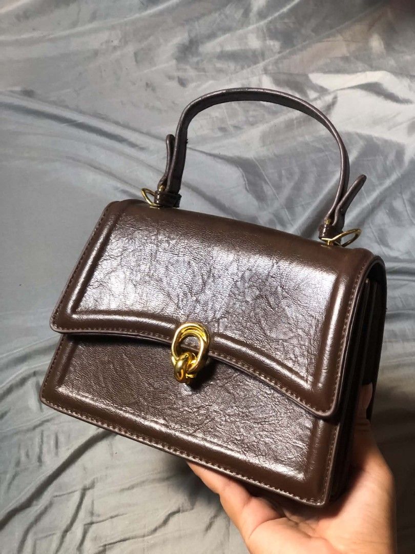 brown gold hardware hand/sling bag (Category: Clutches) located in Manila. Submitted by hollysansh (Listing ID 1463283585, Image 1). Description: .