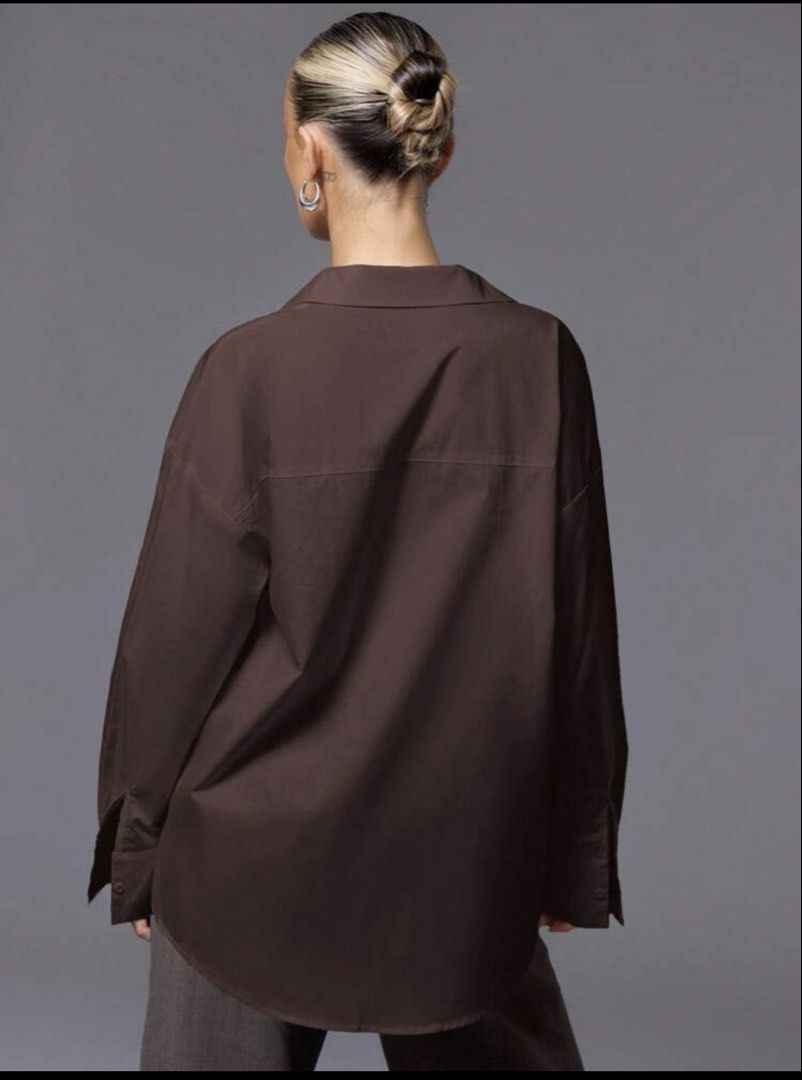 Brown long sleeve cotton fabric from SHEIN (Category: Longsleeves) located in Virac. Submitted by cams_2601 (Listing ID 1463217546, Image 3). Description: Chocolate brown color Large size Oversized long sleeve Used twice only .