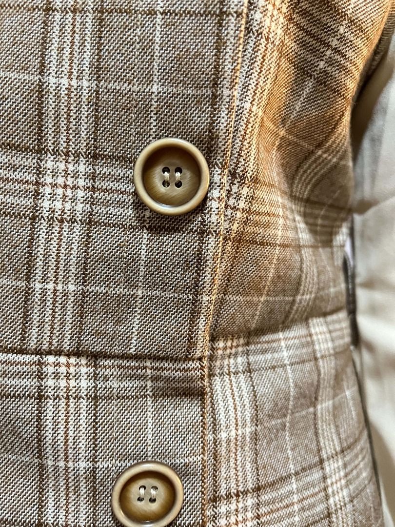 Brown Plaid Dress with Button Detail (Category: Dresses) located in Quezon City. Submitted by bunniezen (Listing ID 1463219396, Image 3). Description: - Classic brown plaid pattern - Contrasting cream top and sleeves - Versatile and stylish for any occasion.