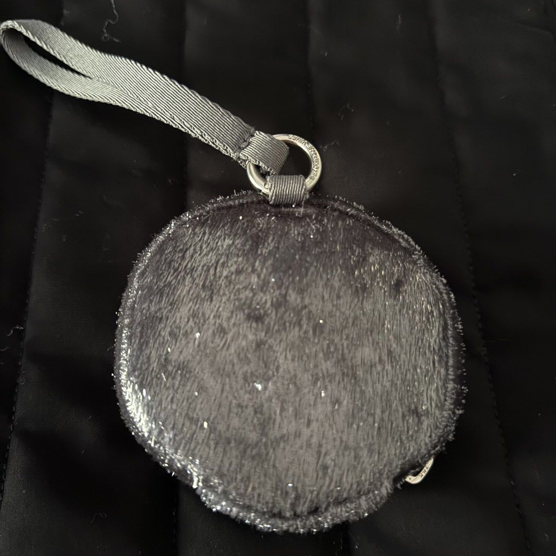 BTV Holiday Round Pouch (Category: Purses & Pouches) located in Makati City. Submitted by imjustagirlxo (Listing ID 1463166619, Image 2). Description: Beyond The Vines Holiday Round Pouch in Grey -barely used -has pockets inside -has a wrist strap -can be used as a bag charm too -store bought.