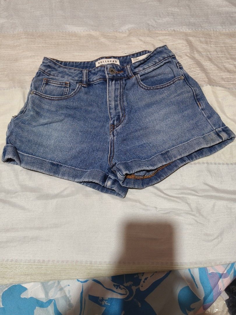 Bullhead Denim Co. Blue Denim Shorts (Category: Shorts) located in Manila. Submitted by immsuarez (Listing ID 1463311432, Image 1). Description: - Brand: Bullhead Denim Co. - Color: Blue Denim - Style: Classic cuffed hem shorts - Closure: Button and zip fly - Pockets: Two front, two back - Occasion: Great for casual wear.