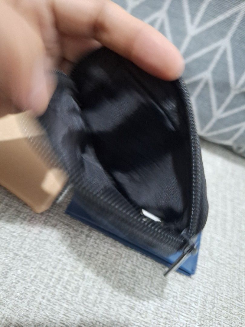 Wallet Bundle B (Category: Wallets & Card holders) located in Naga. Submitted by bellebargainbox (Listing ID 1463186888, Image 3). Description: 1 new a beige online wallet 1 Penshoppe coin purse 1 small card holder almost new.
