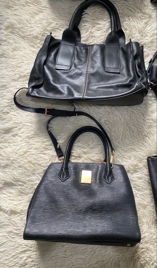 Bundle of 6 Black Leather Handbags (Category: Luxury Bags & Wallets) located in Manila. Submitted by switchcity (Listing ID 1463245969, Image 3). Description: - Bundle of 6 black leather handbags - Variety of styles and sizes included - Features top handles and shoulder straps - Versatile for different occasions - Please check photos for specific details on each bag - Great value bundle deal for all six bags.