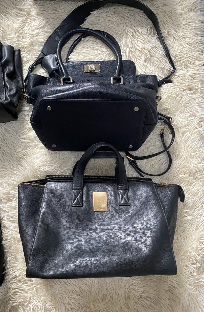 Bundle of 6 Black Leather Handbags (Category: Luxury Bags & Wallets) located in Manila. Submitted by switchcity (Listing ID 1463245969, Image 2). Description: - Bundle of 6 black leather handbags - Variety of styles and sizes included - Features top handles and shoulder straps - Versatile for different occasions - Please check photos for specific details on each bag - Great value bundle deal for all six bags.