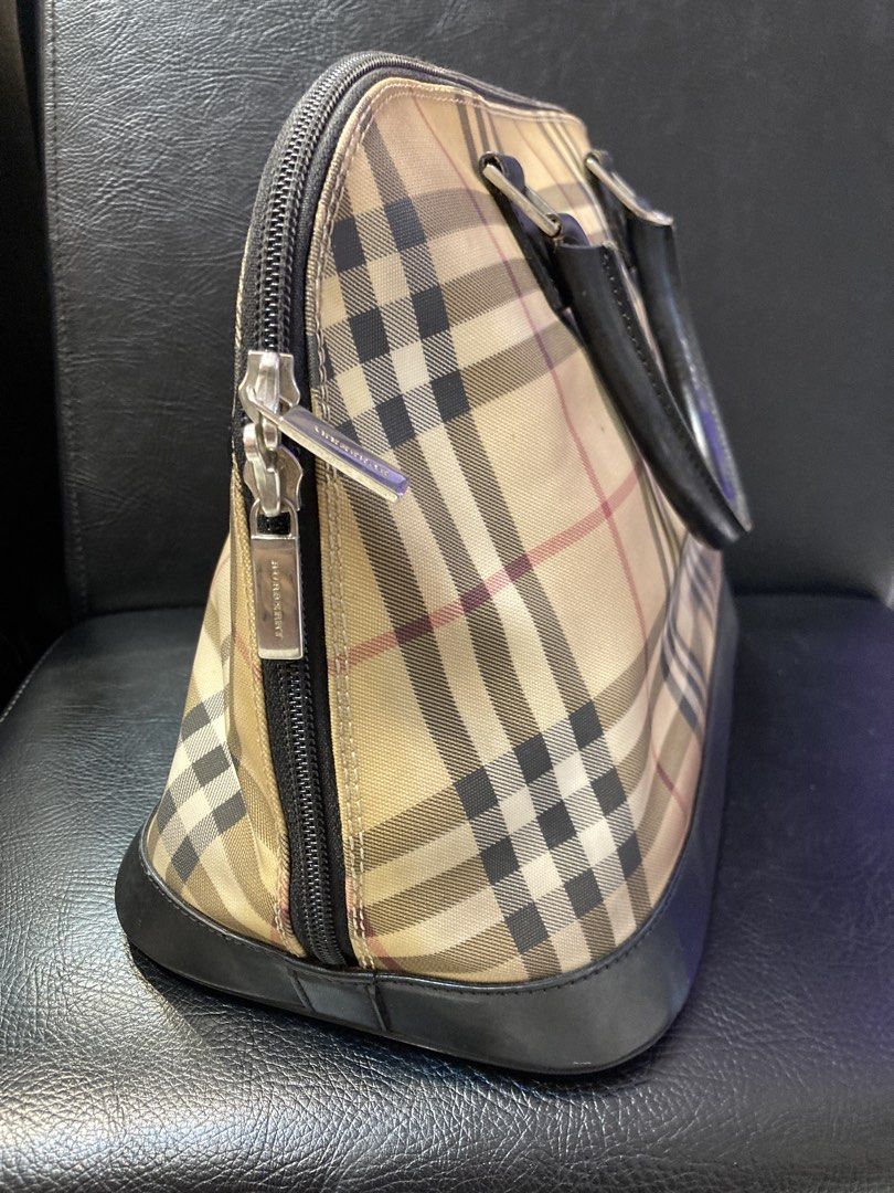 Burberry Alma Dome Bag (Category: Luxury Bags & Wallets) located in Quezon City. Submitted by janisu0303 (Listing ID 1463304625, Image 3). Description: - Burberry Alma dome bag - 10,500 php - good condition - fairview area meetups Or shipping - Iconic Haymarket check canvas - Black leather trim - Top handles - Zipper closure - Timeless and great for daily use Burberry Prada Gucci Miu Miu Balenciaga Soho Chanel.
