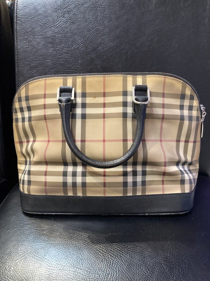 Burberry Alma Dome Bag (Category: Luxury Bags & Wallets) located in Quezon City. Submitted by janisu0303 (Listing ID 1463304625, Image 2). Description: - Burberry Alma dome bag - 10,500 php - good condition - fairview area meetups Or shipping - Iconic Haymarket check canvas - Black leather trim - Top handles - Zipper closure - Timeless and great for daily use Burberry Prada Gucci Miu Miu Balenciaga Soho Chanel.
