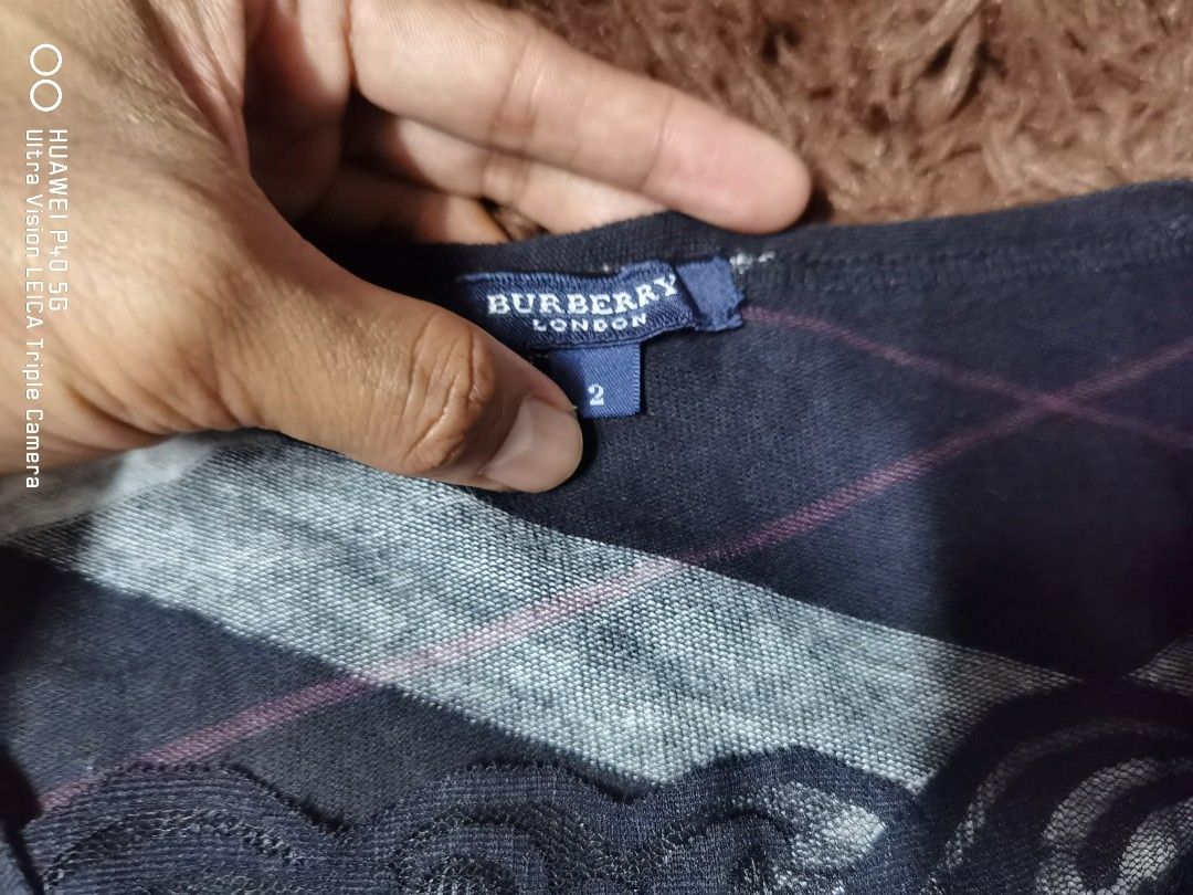 Burberry London Tshirt (Category: Shirts) located in Manila. Submitted by reddvelasquez.2 (Listing ID 1463127922, Image 2). Description: Burberry London Tshirt Size 2 on tag Fits XS-S 15.5 Width 22 Length Like New Condition No issues 800 pesos PM.