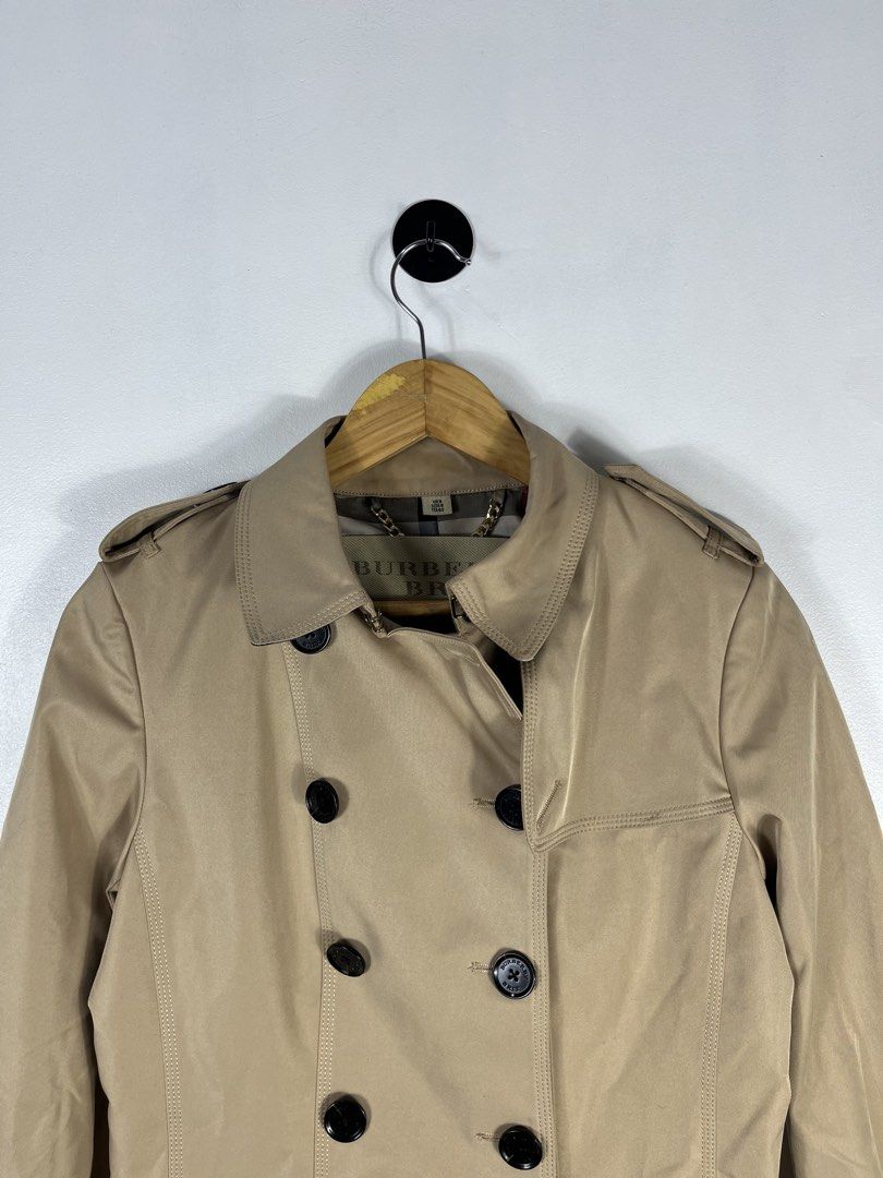 Burberry trench coat (Category: Coats, Jackets and Outerwear) located in Bacolod City. Submitted by piquedup.ph_v2 (Listing ID 1463203522, Image 3). Description: Burberry Trench Coat -Authentic Size: | 18x34 Condition: Excellent Color rate: 9.5/10 (Color may vary to lighting) Flaws: None.