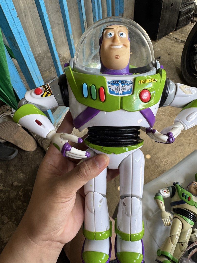 Buzz Lightyear Takara Tomy (Category: Figurines & Statues) located in Tarlac. Submitted by jericoooooo_ (Listing ID 1463247810, Image 3). Description: - Buzz Lightyear action figure from Toy Story - Movable joints for dynamic posing - Helmet opens and closes - Great for fans of the movie - Classic toy for any collection.