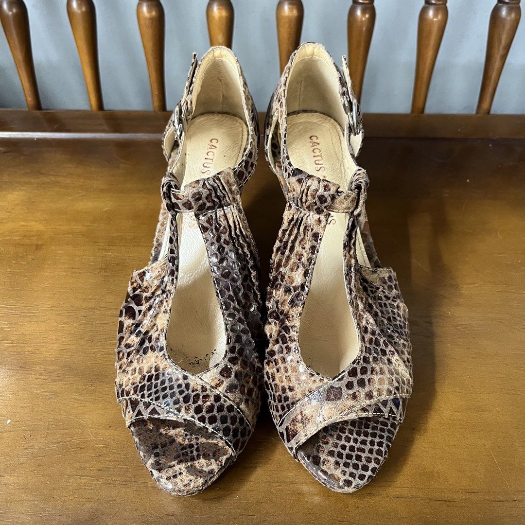 Cactus Japan Snake Print T-Strap Heels (Category: Heels) located in Calamba. Submitted by jupreloved_ (Listing ID 1463147004, Image 1). Description: Cute Cactus Japan heels with snake print. Open toe, t-strap with buckle. Chunky block heel. Perfect for dressing up! Brand: Cactus Japan Size: 37 Women Shipping through J&T. Payment are strictly through GCASH only, no COD. Exact size and color may be different from the picture. This is a preloved ite