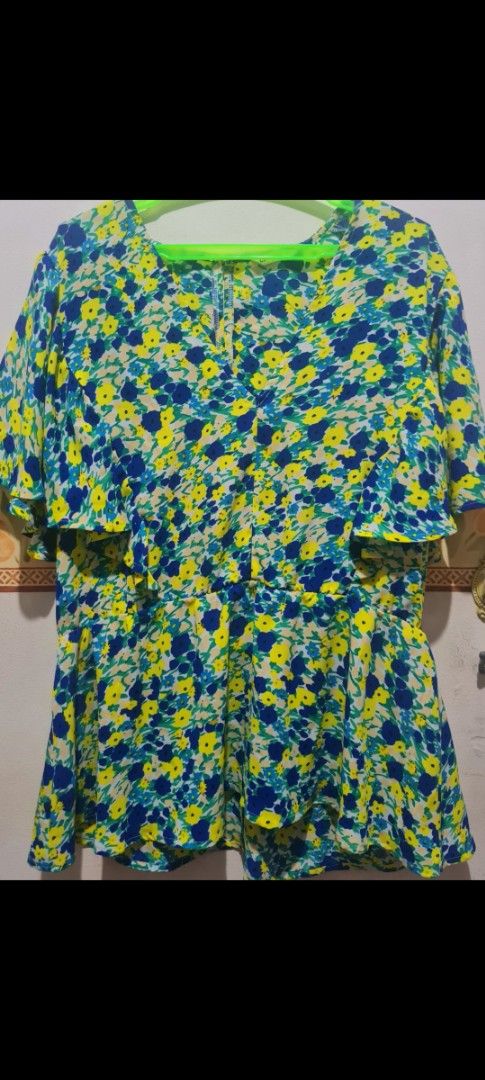 Calliope Floral Print Blouse XL (Category: Rompers) located in Manila. Submitted by jazgotlucky (Listing ID 1463165814, Image 1). Description: - Brand: Calliope - Style: Floral Print Blouse - Colors: Yellow, Blue, Green - Size: XL - Features: Elasticated waist, short flutter sleeves - Occasion: Casual outings - no issue, decluttering.