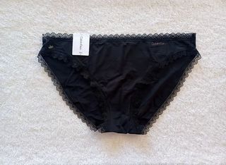 Calvin Klein Black Nylon Bikini Panties (Category: Undergarments & Loungewear) located in Manila. Submitted by april_sixteen (Listing ID 1463204385, Image 1). Description: - Brand: Calvin Klein - Style: Bikini Panties - Color: Black - Features: Delicate lace trim along edges - Material: Soft fabric for comfort - Condition: Brand new with tags attached - Perfect for everyday wear.