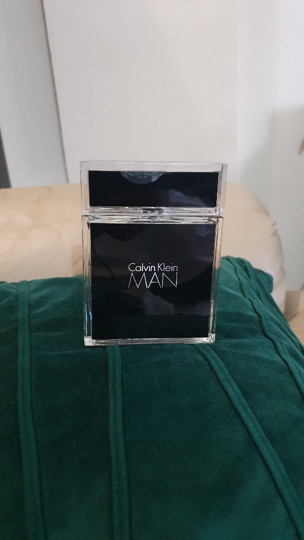 Calvin Klein MAN Eau de Toilette (Category: Fragrance & Deodorants) located in Las Pinas. Submitted by imhislily (Listing ID 1463196274, Image 2). Description: - Calvin Klein MAN Eau de Toilette Spray - For Men - Sleek black and clear glass bottle - Great scent for everyday wear - Bottle is full - Original packaging not shown - just removed from box to display as part of collection.