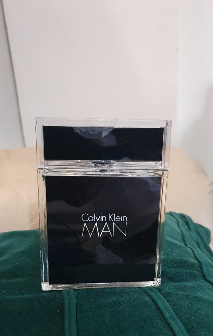Calvin Klein MAN Eau de Toilette (Category: Fragrance & Deodorants) located in Las Pinas. Submitted by imhislily (Listing ID 1463196274, Image 1). Description: - Calvin Klein MAN Eau de Toilette Spray - For Men - Sleek black and clear glass bottle - Great scent for everyday wear - Bottle is full - Original packaging not shown - just removed from box to display as part of collection.
