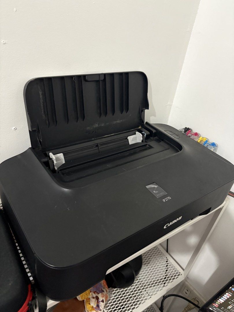 Canon PIXMA IP2770 Printer (Category: Printers, Scanners & Copiers) located in Makati City. Submitted by sseurekiii (Listing ID 1463223410, Image 3). Description: - Canon PIXMA IP2770 Printer - Color: Black - Compact design, perfect for home or office - Ink cartridges visible in photos - Still works well but needs cleaning - Comes with extra inks .