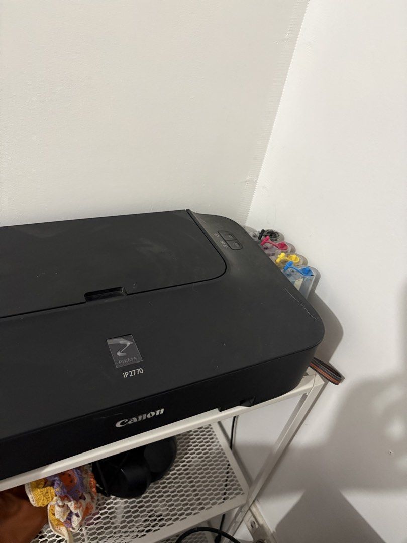 Canon PIXMA IP2770 Printer (Category: Printers, Scanners & Copiers) located in Makati City. Submitted by sseurekiii (Listing ID 1463223410, Image 2). Description: - Canon PIXMA IP2770 Printer - Color: Black - Compact design, perfect for home or office - Ink cartridges visible in photos - Still works well but needs cleaning - Comes with extra inks .