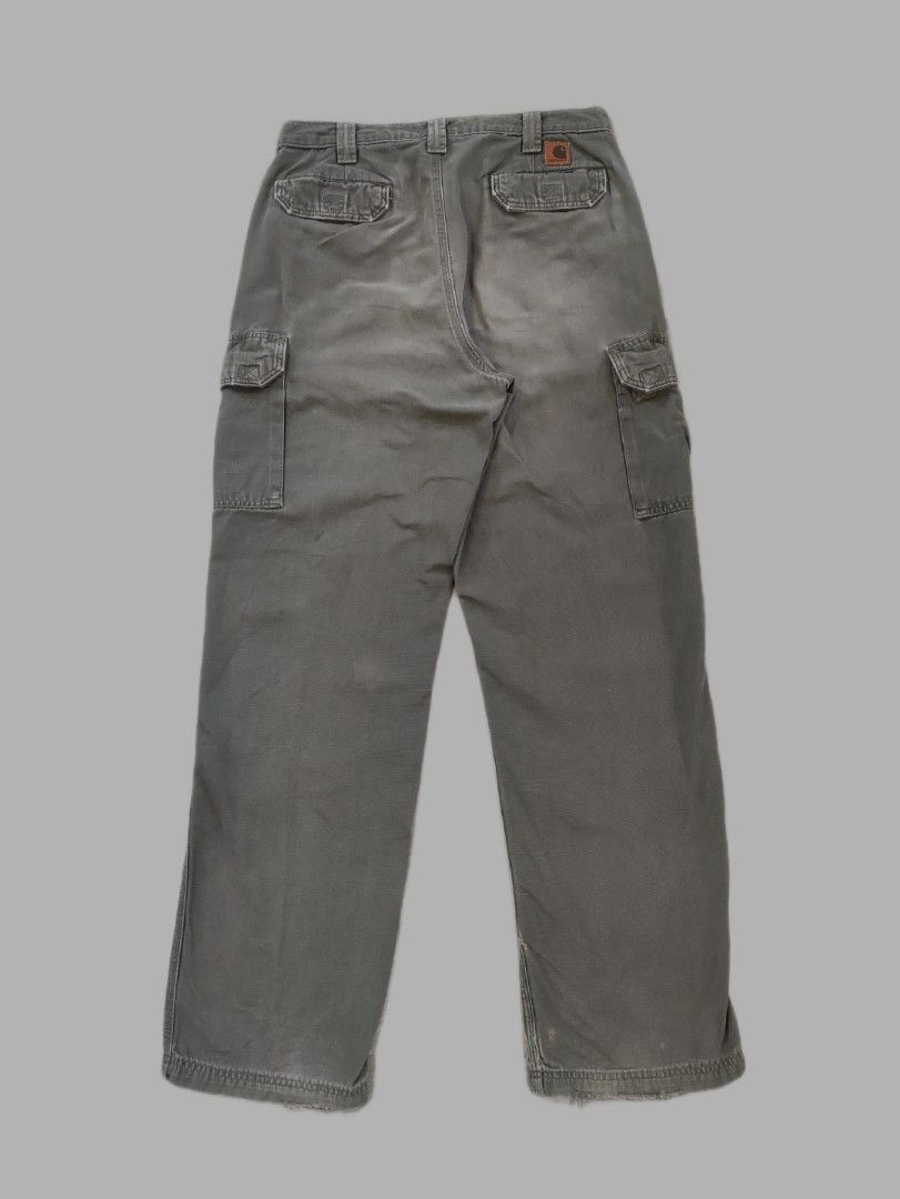 Carhartt B182 DMC Cargo Pants (Category: Jeans) located in Calamba. Submitted by alorbis96758 (Listing ID 1463227863, Image 1). Description: ▪️Dimensions Length : 44.5 Waist : 32 Hem : 9 ▪️Dungaree Fit ▪️Zippers Working Condition : Excellent ▪️Complete Tags ✅ ▪️Overall Condition : Used - Workwear ▪️Issues : Distress, Fade, Stains.