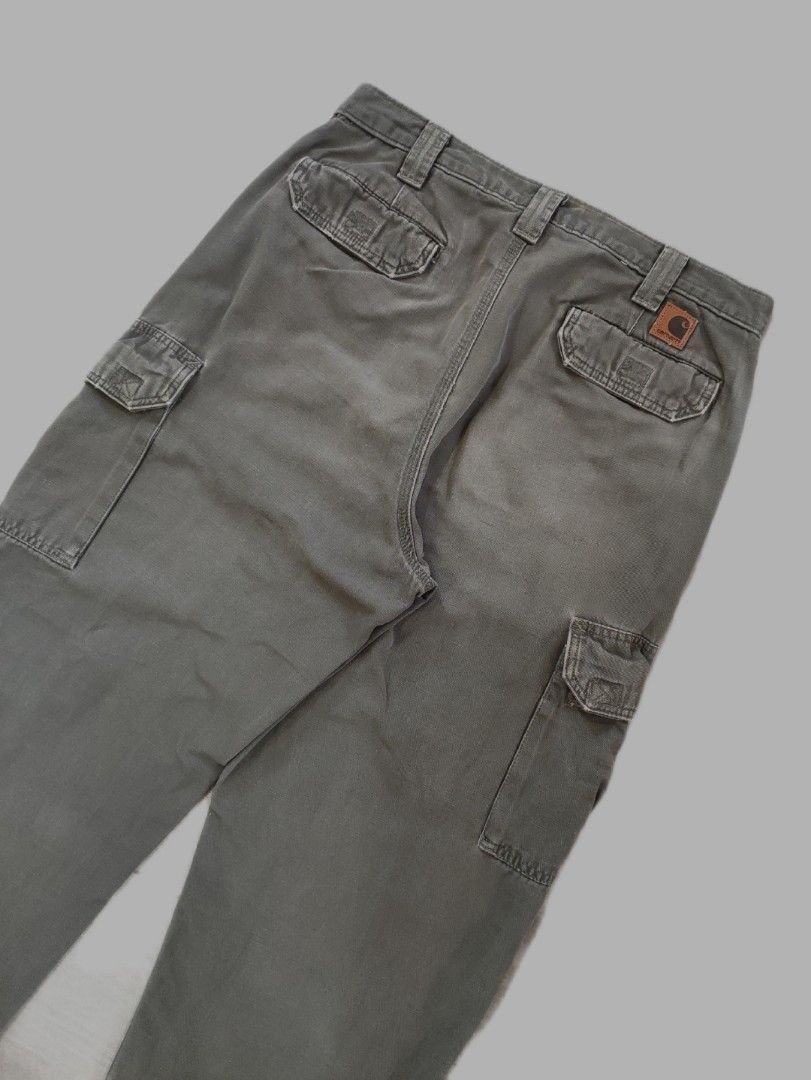 Carhartt B182 DMC Cargo Pants (Category: Jeans) located in Calamba. Submitted by alorbis96758 (Listing ID 1463227863, Image 2). Description: ▪️Dimensions Length : 44.5 Waist : 32 Hem : 9 ▪️Dungaree Fit ▪️Zippers Working Condition : Excellent ▪️Complete Tags ✅ ▪️Overall Condition : Used - Workwear ▪️Issues : Distress, Fade, Stains.