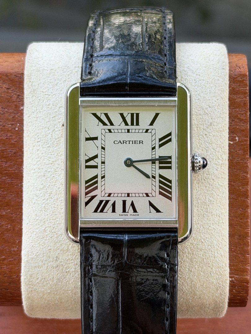 Cartier Tank Solo Large (Category: Luxury Watches) located in Quezon City. Submitted by lucas_luxuries (Listing ID 1463298619, Image 3). Description: For sale! Cartier Tank Solo Large ₱170,000 only • Condition: 9/10 • Inclusions: Box, Cartier pouch, Cartier service paper • High-autonomy Cartier Quartz • 34.8mm case diameter and 5.5mm case thickness • Clear silvered opaline dial with black Roman numeral markers • Signature Blued-steel sword-shaped