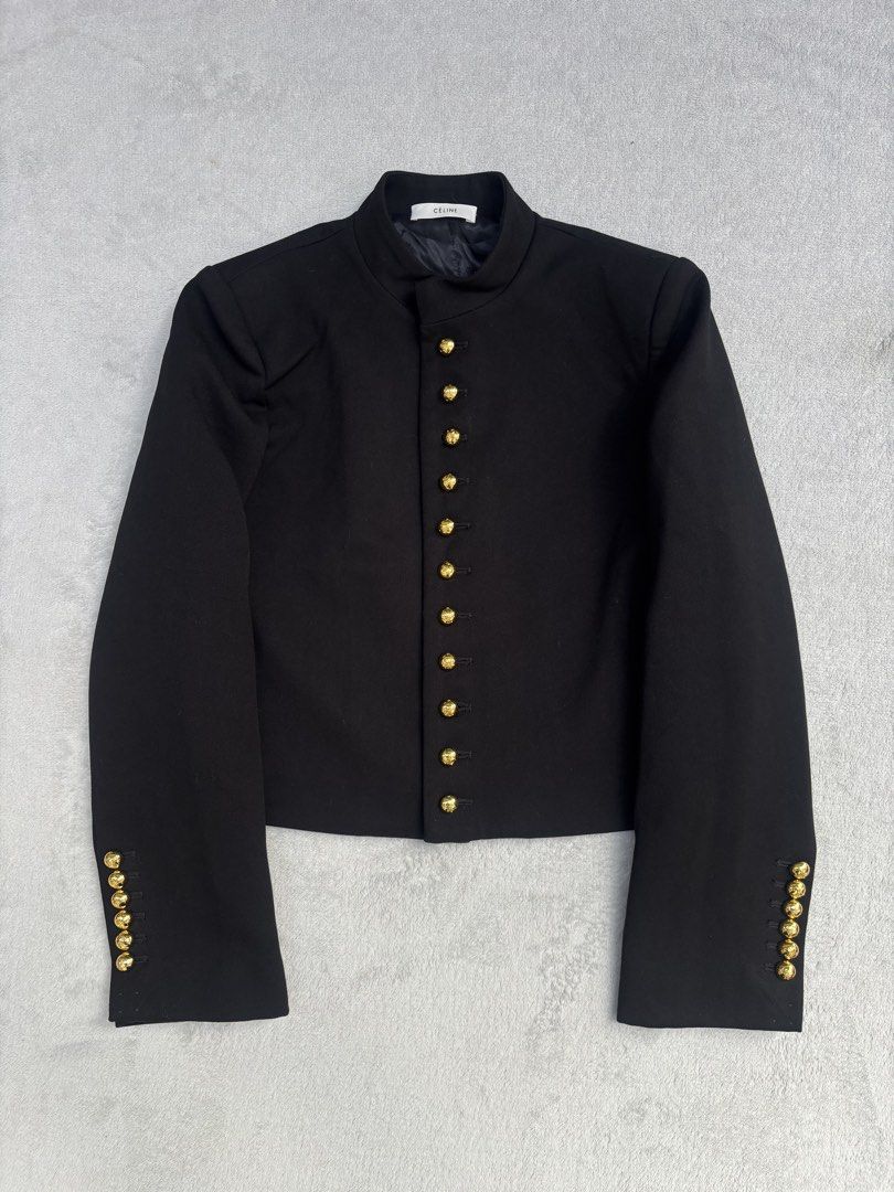 Celine Diagonal Wool Military Jacket (Category: Coats, Jackets and Outerwear) located in Baguio. Submitted by thecollector2600 (Listing ID 1463185214, Image 1). Description: Solid metal buttons Military type design As new 18” width Length18” Shoulder 15” 22.5” sleeves.