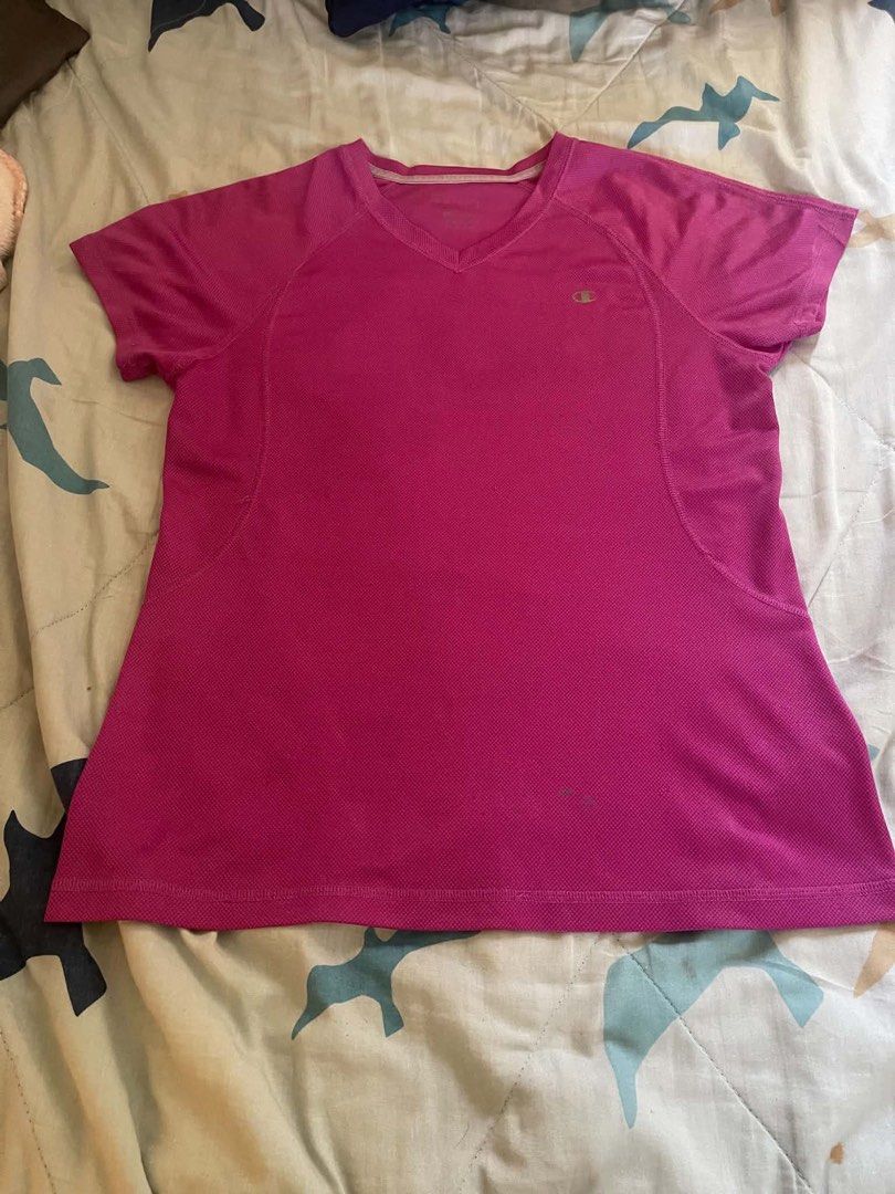 Champion Pink Athletic T-Shirt (Category: Activewear) located in Valenzuela. Submitted by geljho16 (Listing ID 1463197718, Image 1). Description: - Pink Champion t-shirt - Short sleeves, V-neck design - Perfect for workouts or casual outings - Lightweight and breathable fabric ⛔️ issue sign of usage / stain at the last pic 📸 - 17 width x 24 Length.