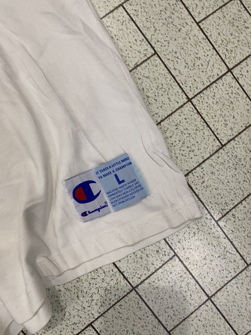 Champion White T-Shirt Size L (Category: Tshirts & Polo Shirts ) located in Manila. Submitted by sepamorash53558 (Listing ID 1463246259, Image 3). Description: - White Champion T-shirt - Features iconic C logo on chest - Smaller C logo detail on sleeve - Size: Large (L) - Made in the USA - Ideal for casual and everyday styling.