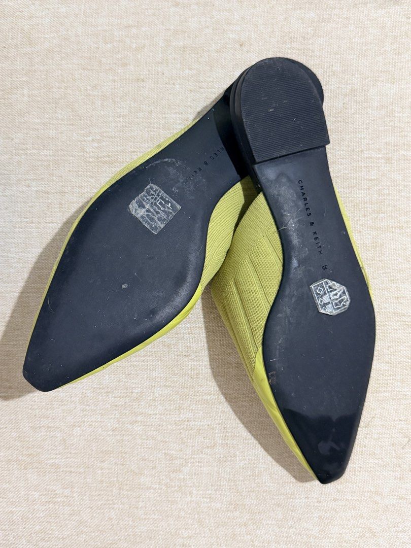 Charles & Keith Lime Green Knit Pointed-Toe Mules (35) (Category: Flats & Sandals) located in Guinobatan. Submitted by ktonkatsu (Listing ID 1463123662, Image 3). Description: - Charles & Keith knit mules - Chic pointed toe design - Easy slip-on style for convenience - Unique knit texture for added detail - Soles show minimal signs of wear - Perfect for adding a vibrant pop of color to any outfit Loc: Bicol shipping thru J&T.