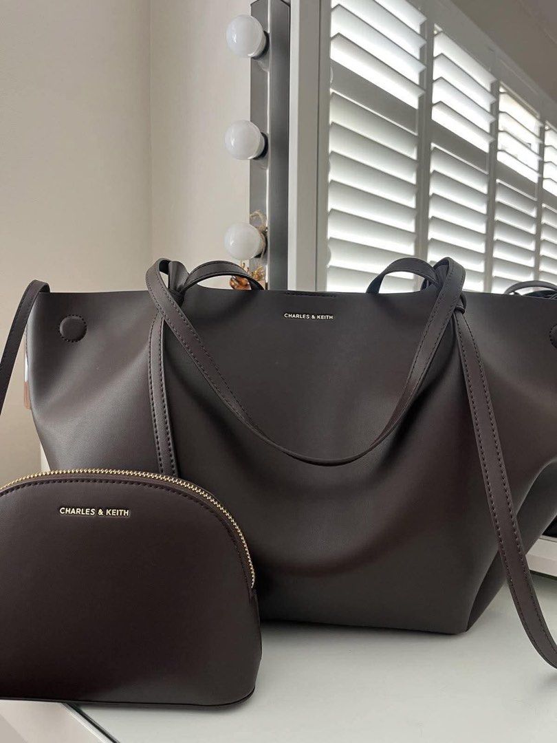 Charles & Keith Tote Bag with Pouch (Category: Tote Bags) located in Manila. Submitted by mellnavarro_45618 (Listing ID 1463142179, Image 3). Description: CNK Calla XL Tote ☁️ Spacious enough to fit a 13–14” laptop! 🥐 Size: 30 × 22–60 × 11.6 cm (H × W × D) 🥐 1,300 + sf.