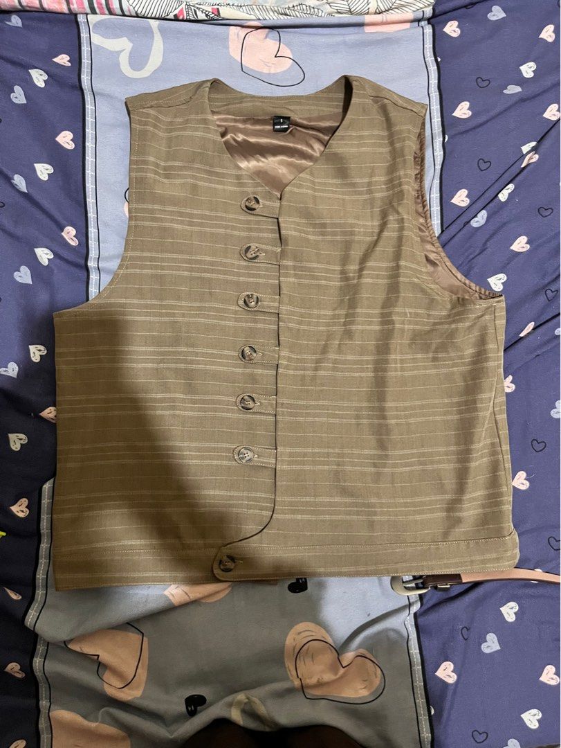 Cheongsam vest (Category: Vests) located in Manila. Submitted by iced_kohi (Listing ID 1463276638, Image 1). Description: Cheongsam vest small on tag (malaki kaya med sya) - 280 once lang nagamit from shein Length 22.5 width 22.5.