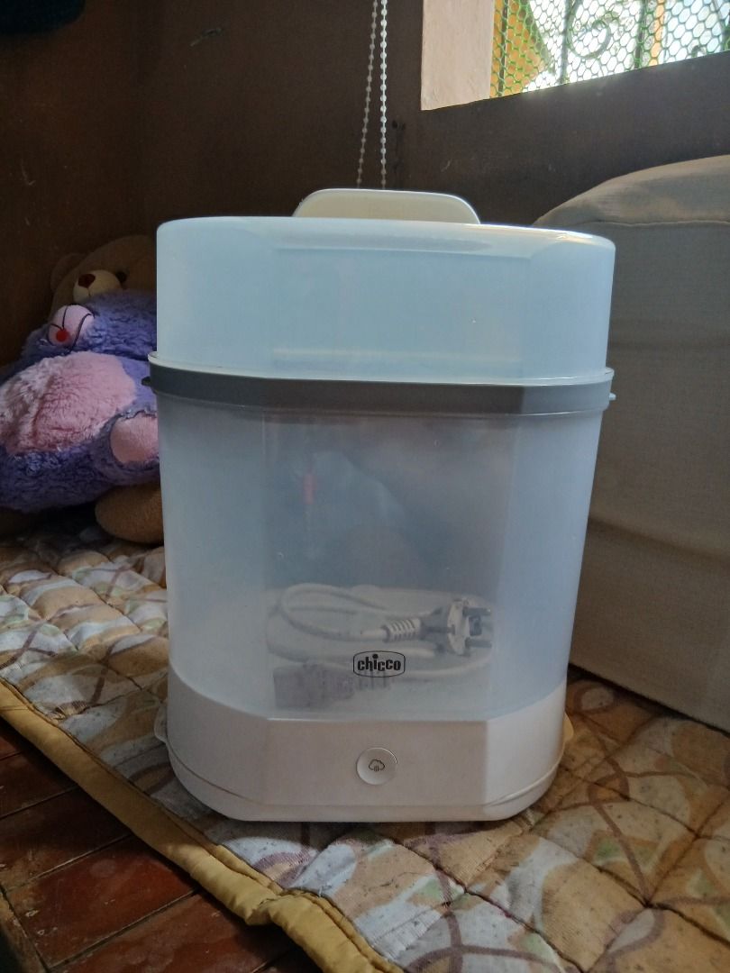 Chicco 3-in-1 Electronicl Bottle Steam Sterilizer (Category: Breastfeeding & Bottle Feeding) located in Caloocan City. Submitted by elypot2k25 (Listing ID 1463192799, Image 1). Description: Lightly used. RFS: Baby refused bottle feeding. .