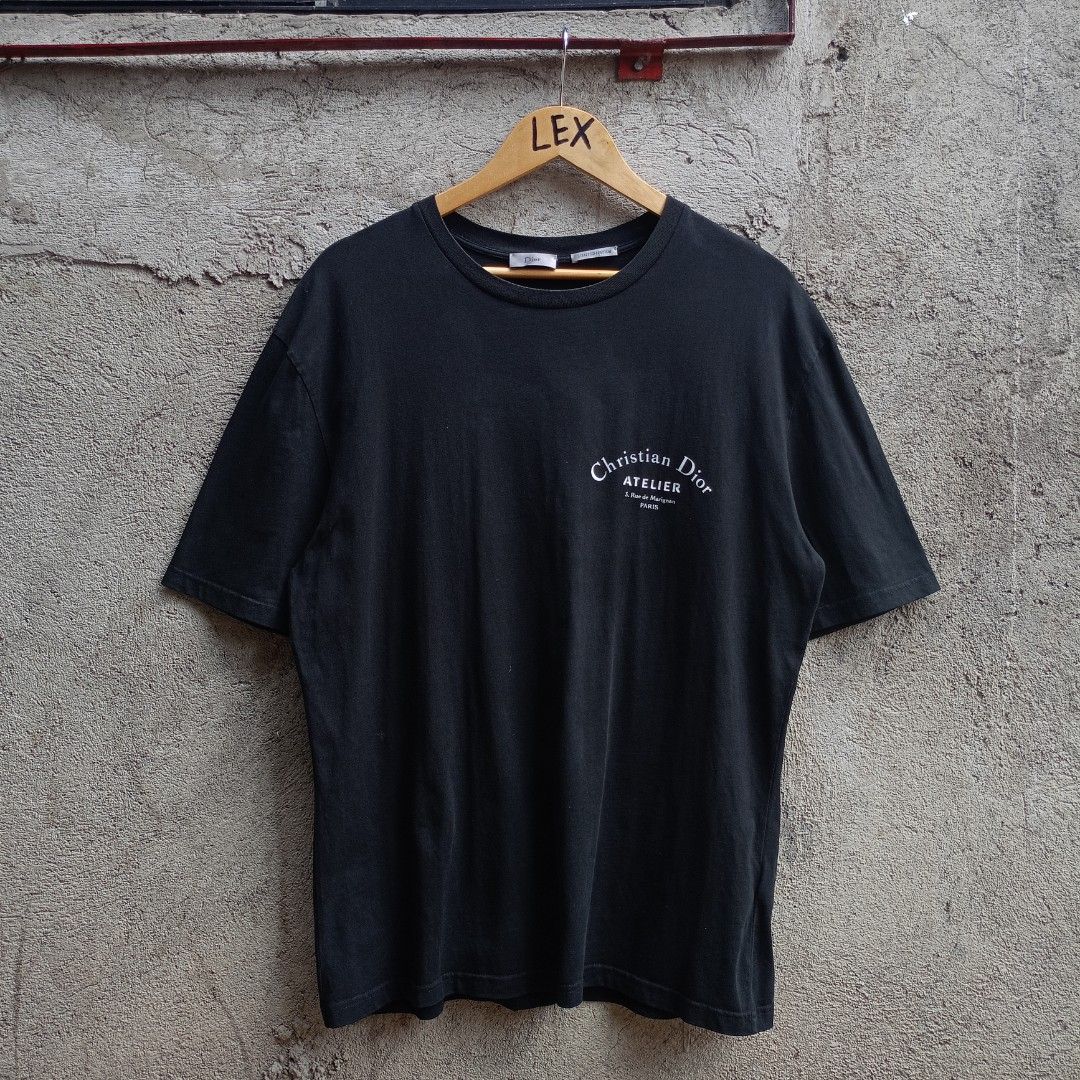 CHRISTIAN DIOR ATELIER (Category: Tshirts & Polo Shirts ) located in Koronadal. Submitted by thriflex.29 (Listing ID 1463272552, Image 1). Description: CHRISTIAN DIOR ATELIER Size On Tag: Large Measurements: Width 21.5 Length 27.5 Condition: 9/10 - Excellent Colorate: 9.5/10 Issue: Pinholes Mine: 400.