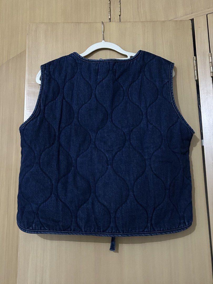 Cider Quilted Denim Vest with Tie Front (Category: Sleeveless) located in Baguio. Submitted by tresmariascloset13 (Listing ID 1463226545, Image 3). Description: - Dark wash denim vest - All-over quilted pattern - Tie-front closure - Sleeveless design - Ideal for layering over shirts or dresses - Brand: Cider - Size: S.
