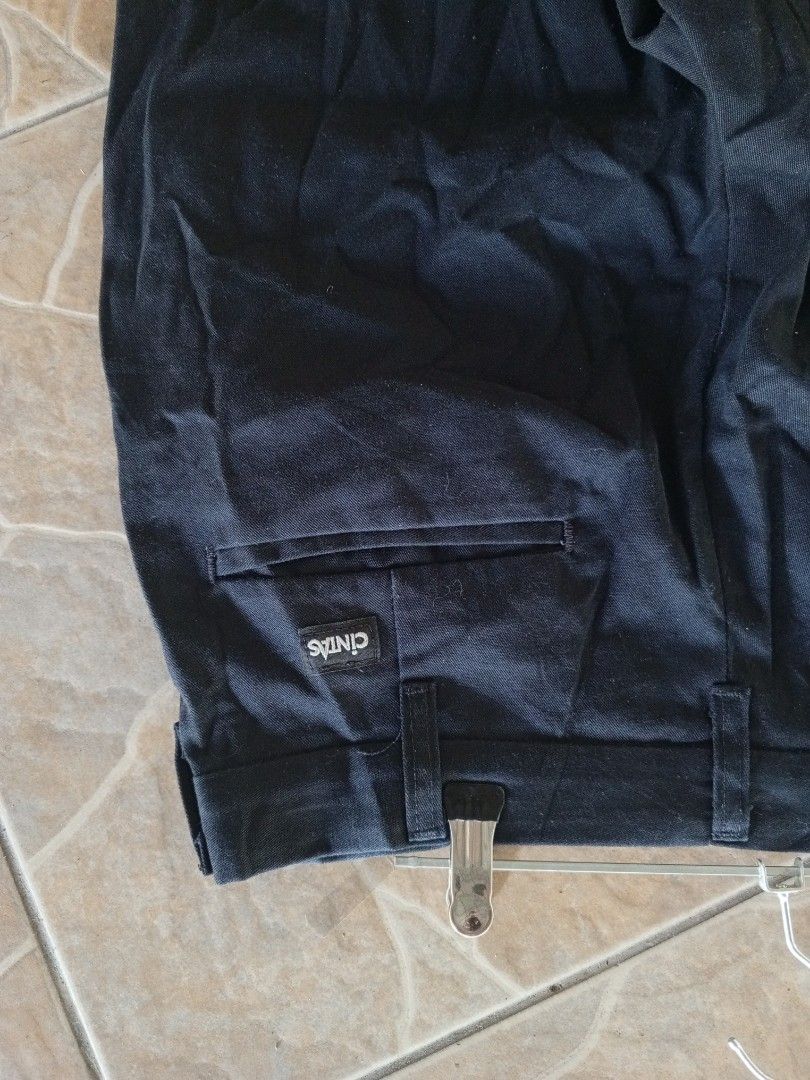 Cintas ComfortFLEX Pants Size 32x35 Black Polyester Blend (Category: Chinos) located in Orani. Submitted by thriftniea (Listing ID 1463203548, Image 3). Description: W33 L42 H8 - Black Cintas work pants - Size: 32 waist, 35 inseam - Material: Polyester and cotton blend (ComfortFLEX) - Ideal for: Work and everyday wear - Care: Refer to label for instructions.
