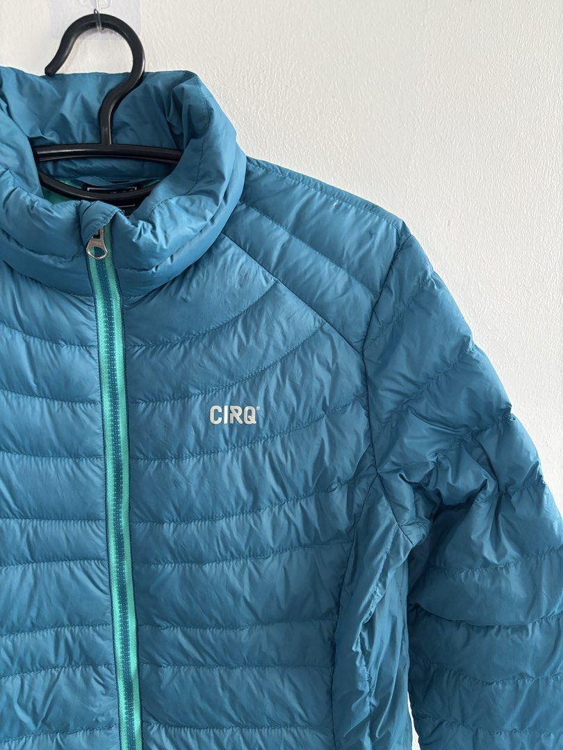 CIRQ Teal Down Puffer Jacket - Size Medium (Category: Coats, Jackets and Outerwear) located in Muntinlupa City. Submitted by jc444_ (Listing ID 1463306211, Image 2). Description: - Teal CIRQ puffer jacket - Lightweight and warm - Full zip front - Zippered pockets - Contrasting teal inside lining - Perfect for layering or cooler weather.
